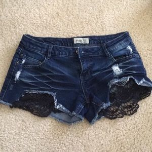 Distressed lace jean shorts